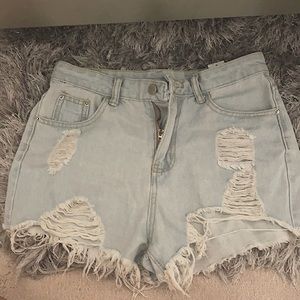 Ripped light wash jean shorts